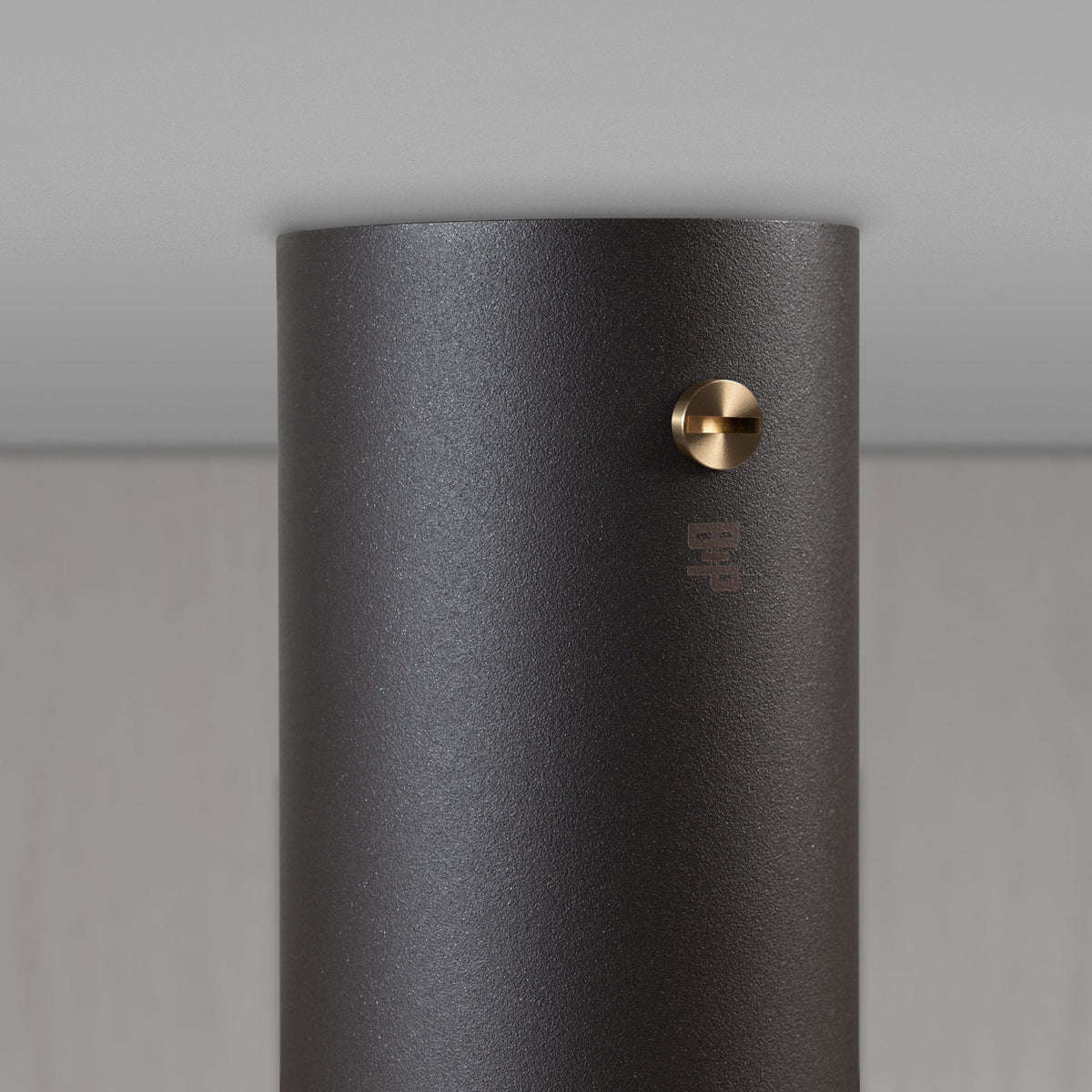 Exhaust Surface Mounted Downlight in a Graphite Finish with Brass Detail