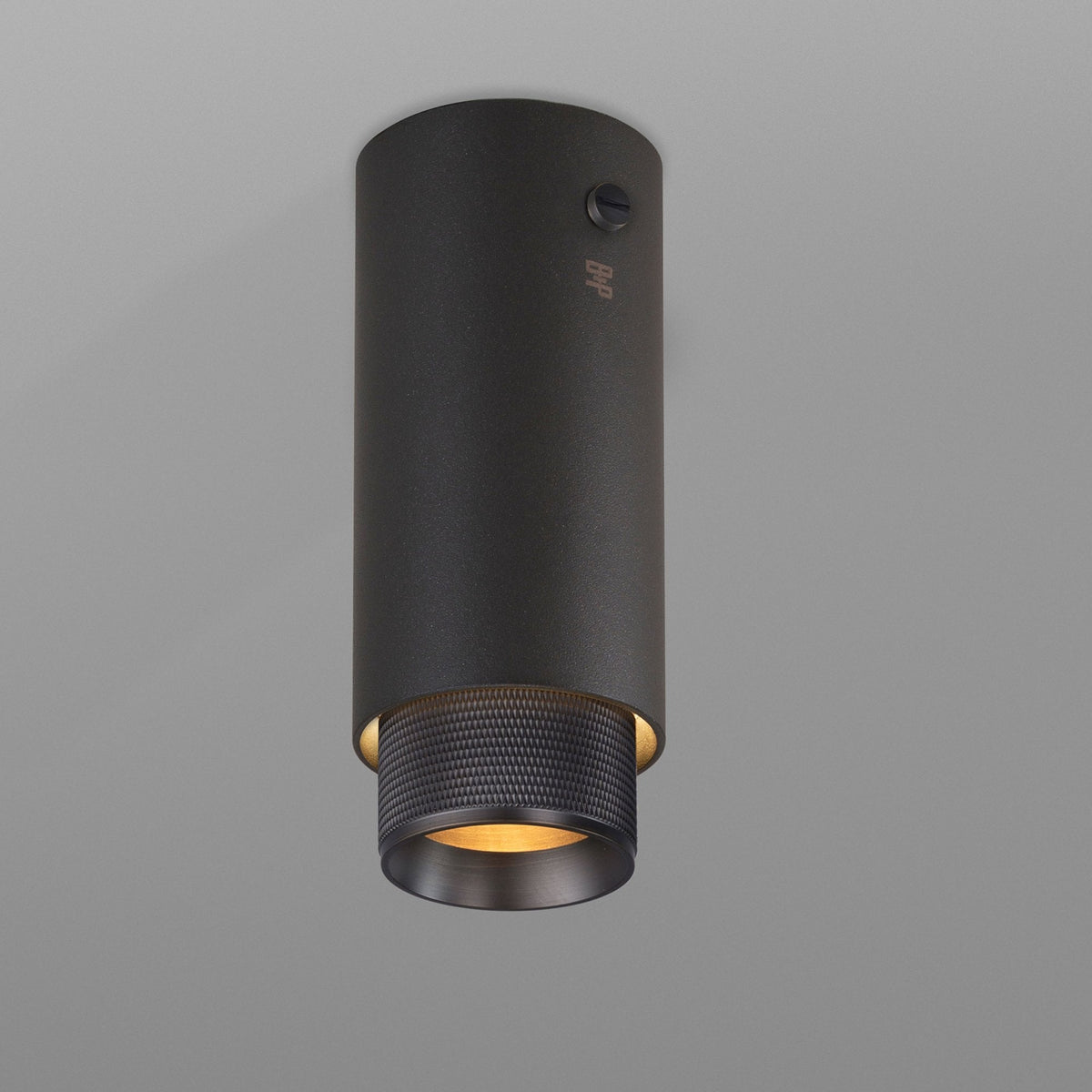 Exhaust Surface Mounted Downlight in a Graphite Finish with Smoked Bronze Detail