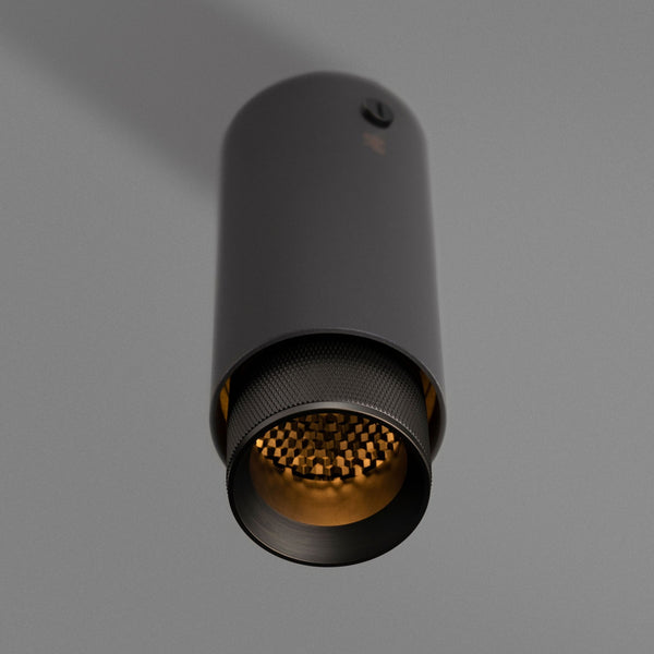 Exhaust Surface Mounted Downlight in a Graphite Finish with Smoked Bronze Detail