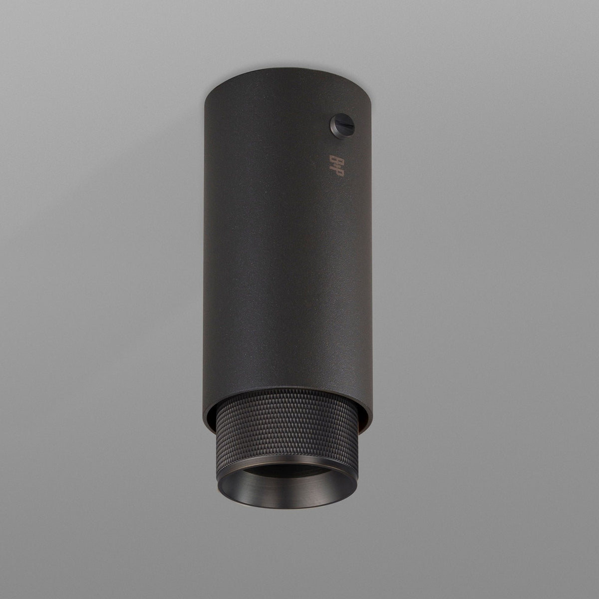 Exhaust Surface Mounted Downlight in a Graphite Finish with Smoked Bronze Detail