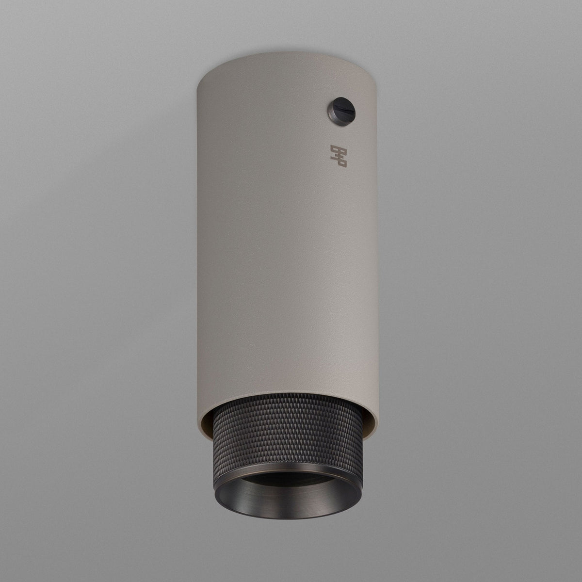 Exhaust Surface Mounted Downlight in a Stone Finish with Smoked Bronze Detail