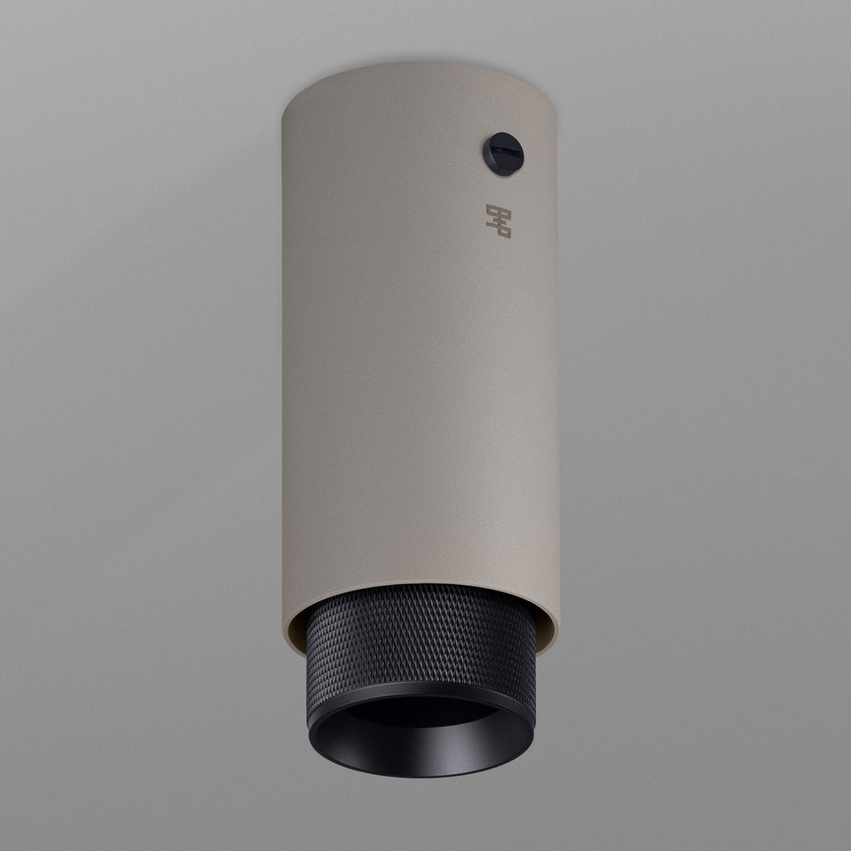 Exhaust Surface Mounted Downlight in a Stone Finish with Black Detail