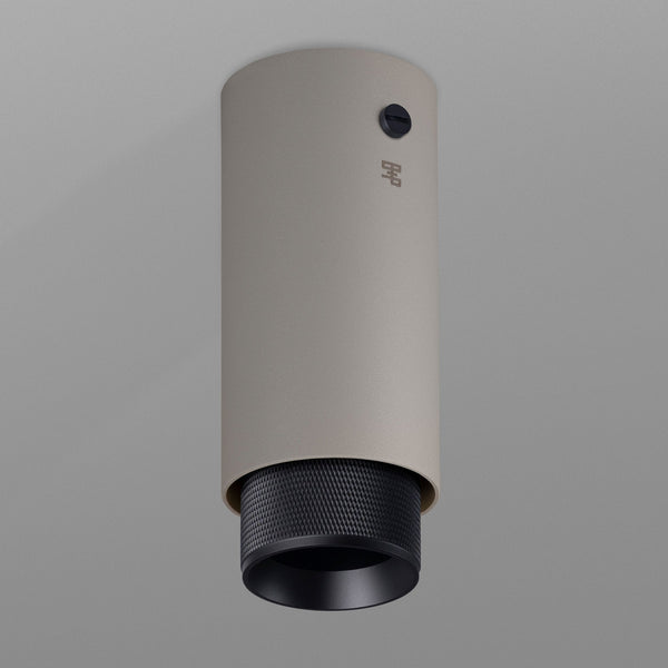 Exhaust Surface Mounted Downlight in a Stone Finish with Black Detail