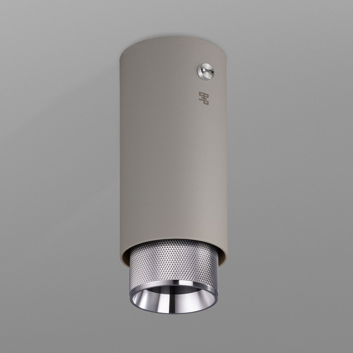 Exhaust Surface Mounted Downlight in a Stone Finish with Steel Detail