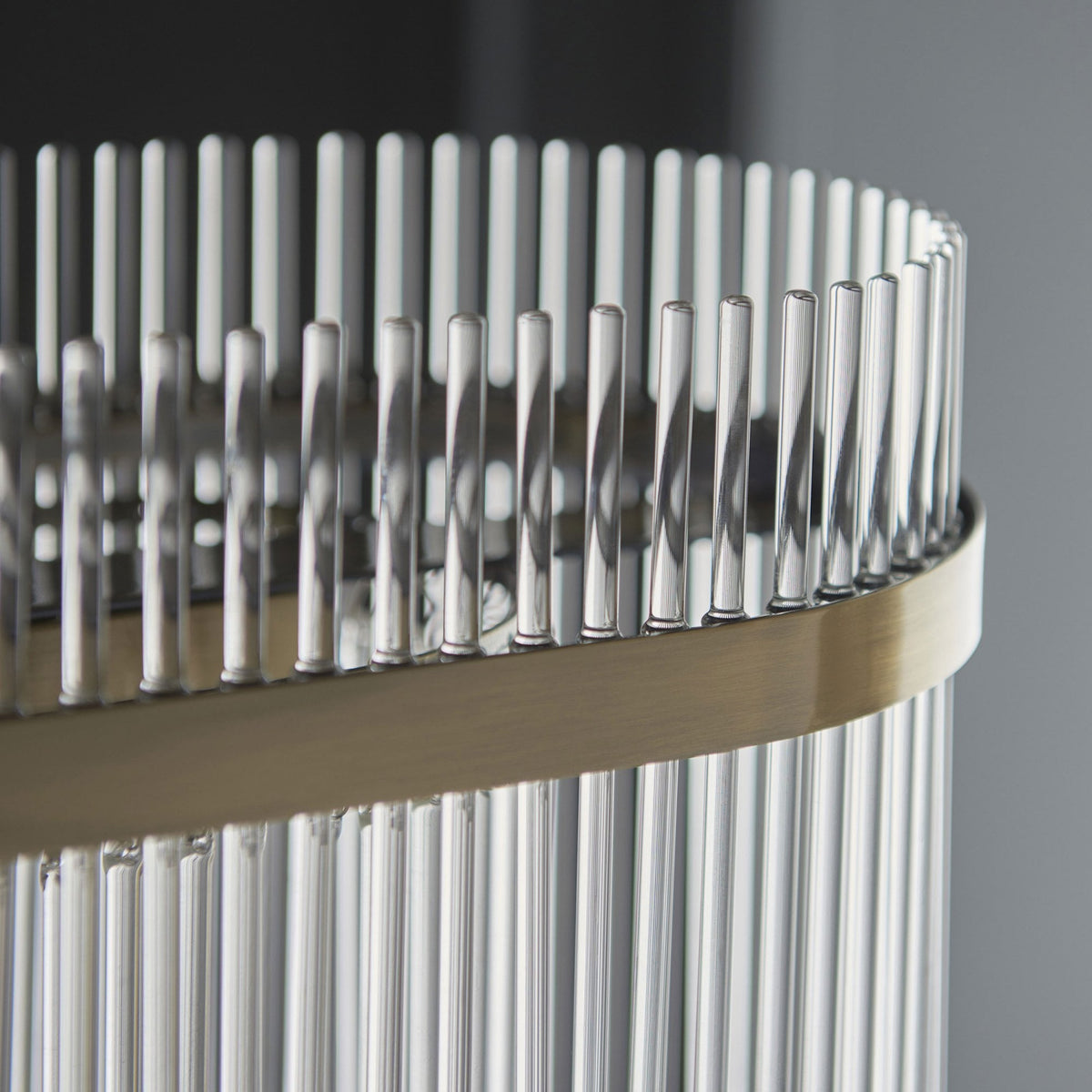 Marietta Four Light Linear Pendant Chandelier in Antique Brass with Clear Glass Rods