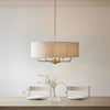 Highclere Eight Light Pendant in Vintage Brass with Natural Shade