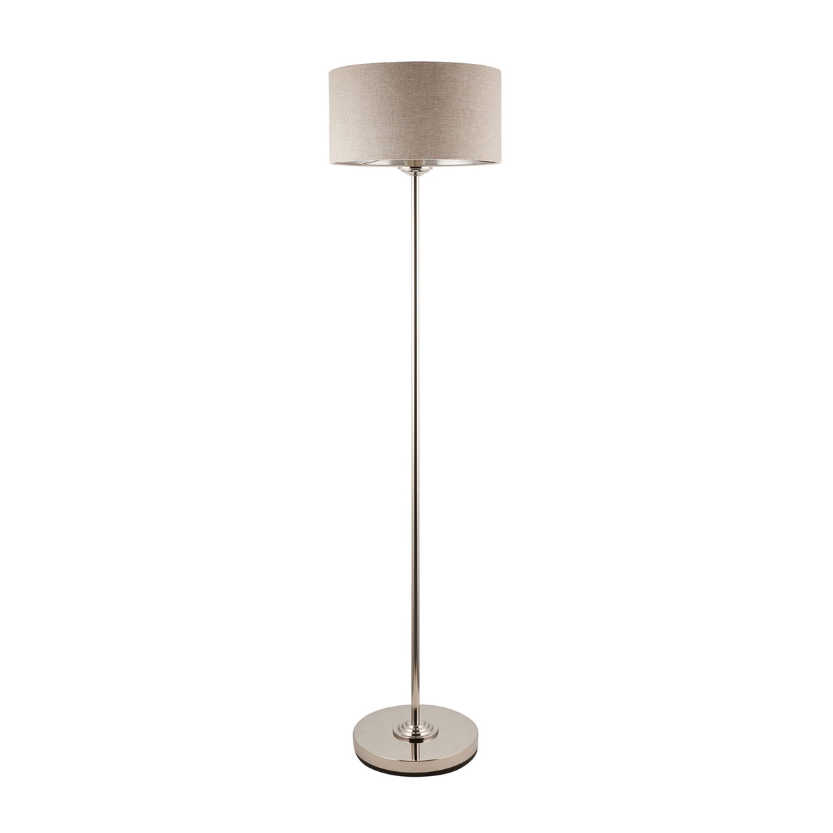 A tall, slender floor lamp with a beige drum shade and a polished silver finish on a white background.