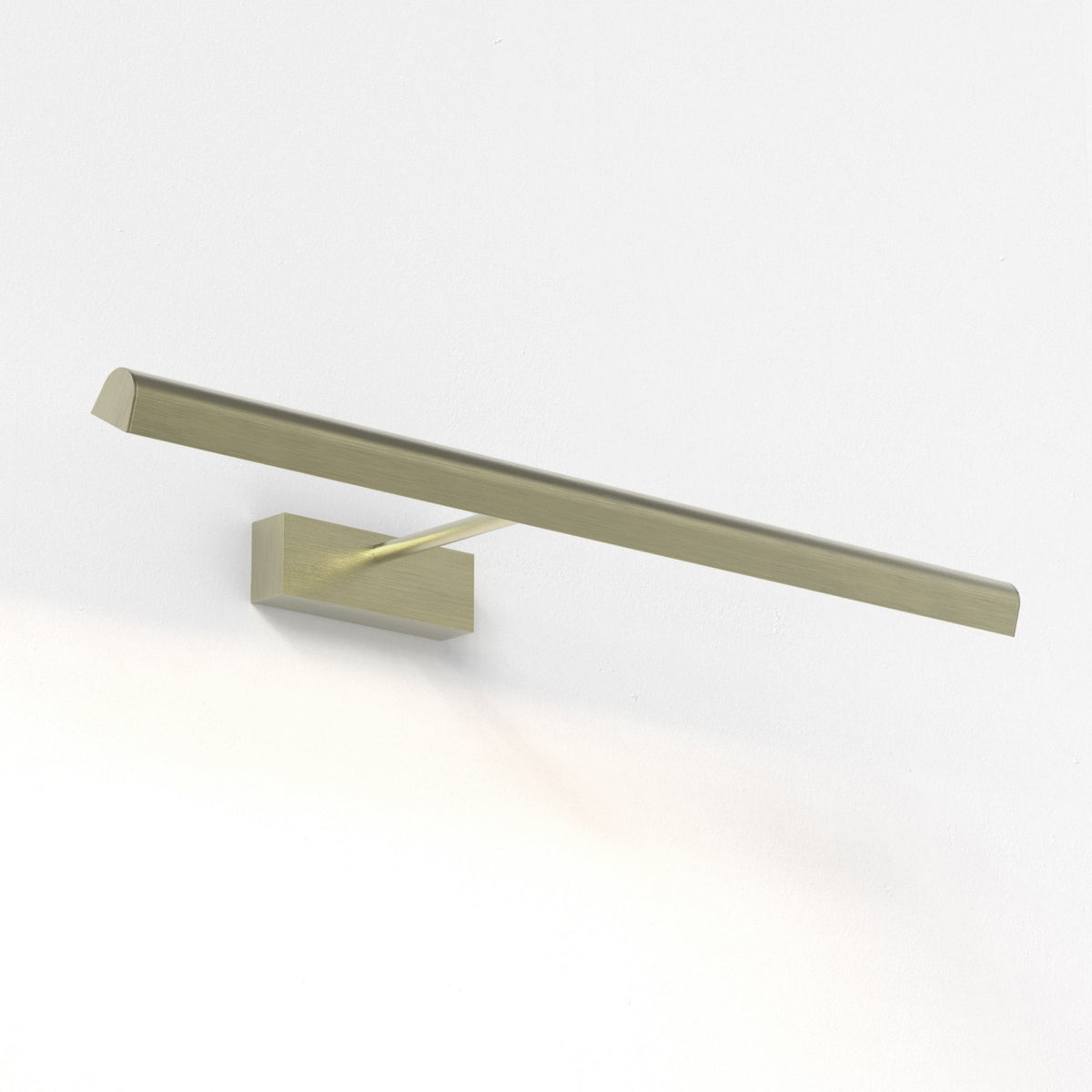 A brass picture light with a rectangular base and a long, thin bar extending horizontally