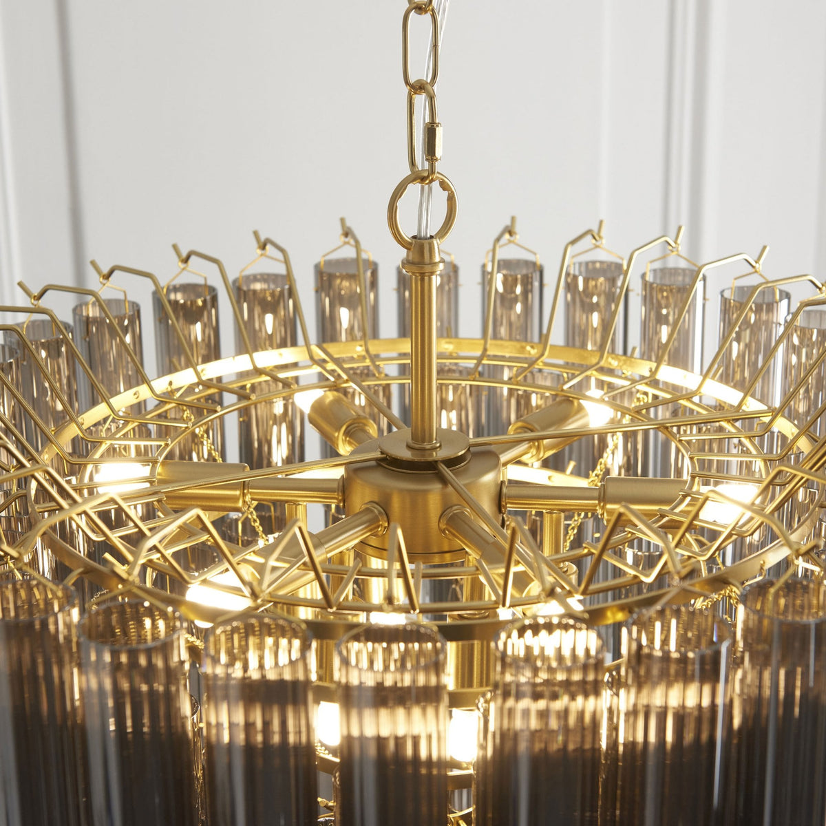 Toulouse Twelve Light Tiered Pendant in Brushed Gold with Ribbed Cylindrical Smokey Glass