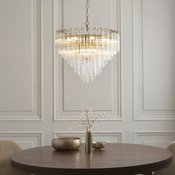 Toulouse Twelve Light Tiered Pendant in Brushed Gold with Angled Ribbed Cylindrical Clear Glass
