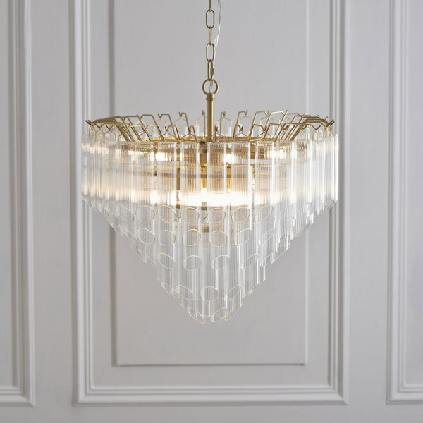 Toulouse Twelve Light Tiered Pendant in Brushed Gold with Angled Ribbed Cylindrical Clear Glass