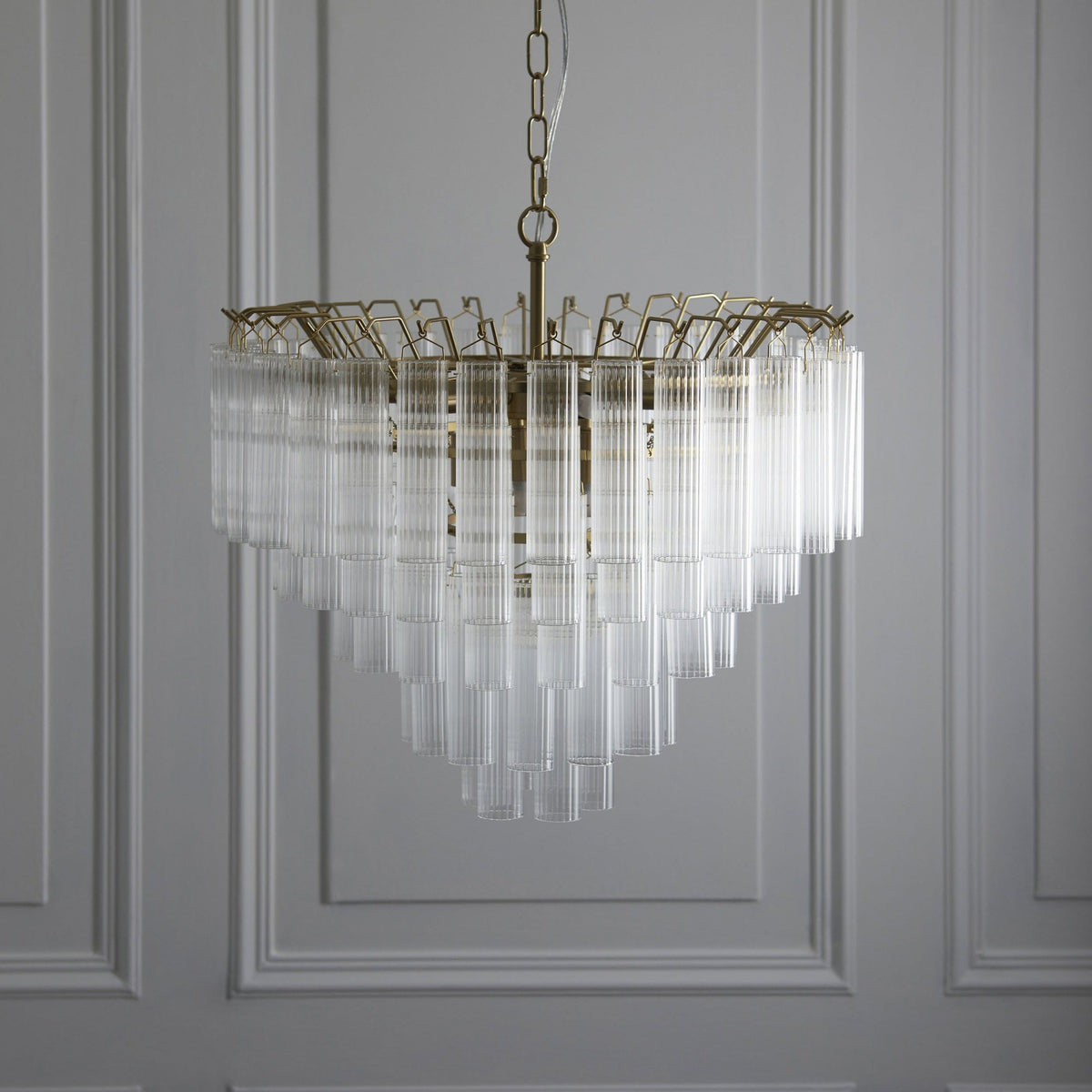 Toulouse Twelve Light Tiered Pendant in Brushed Gold with Ribbed Cylindrical Clear Glass