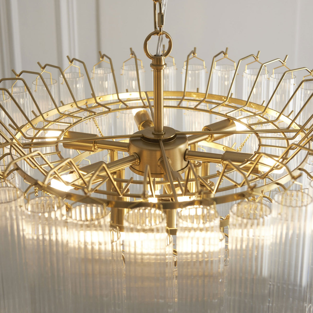 Toulouse Twelve Light Tiered Pendant in Brushed Gold with Ribbed Cylindrical Clear Glass