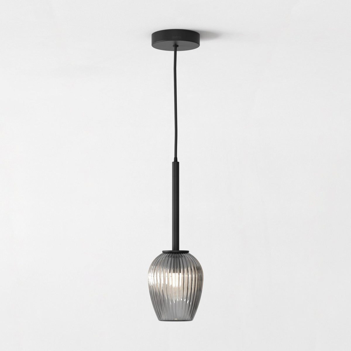 Astro Lighting black pendant light with a ribbed glass shade