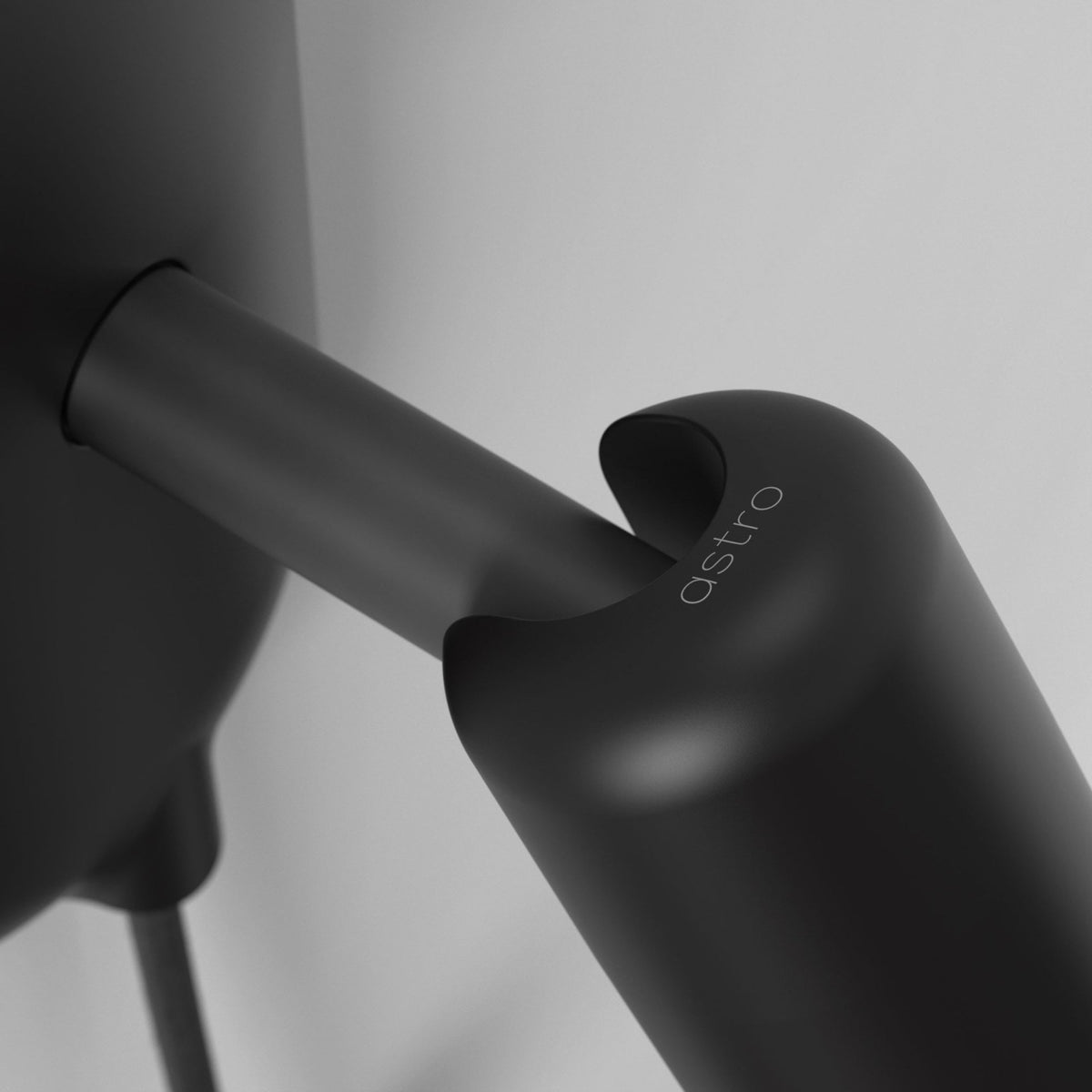 Astro brand logo on a black cylindrical object