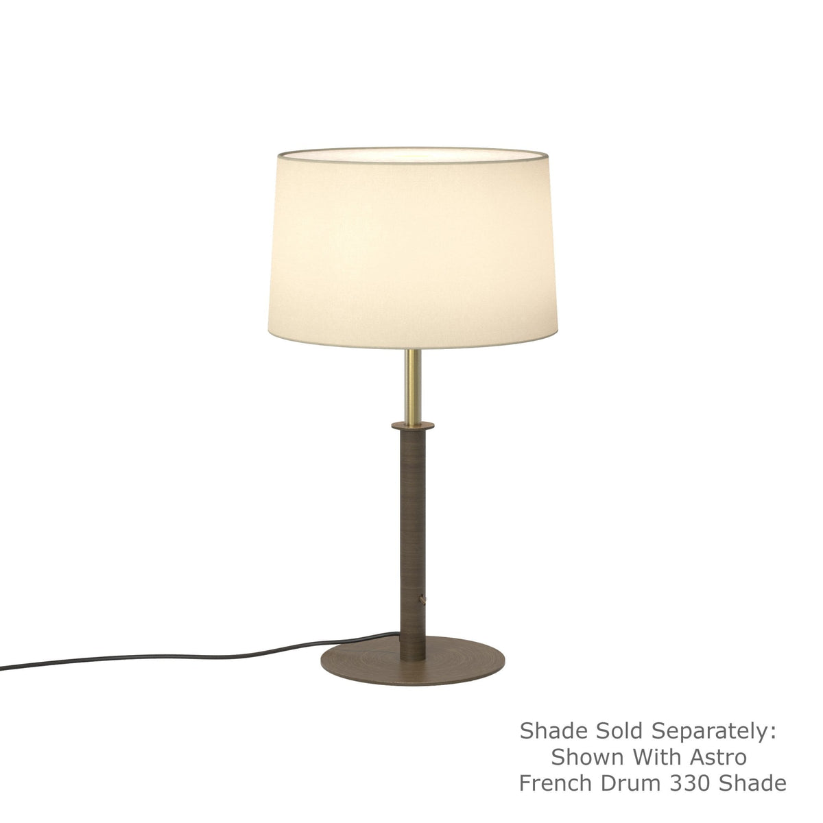 Table lamp with a bronze base and a cream fabric drum shade