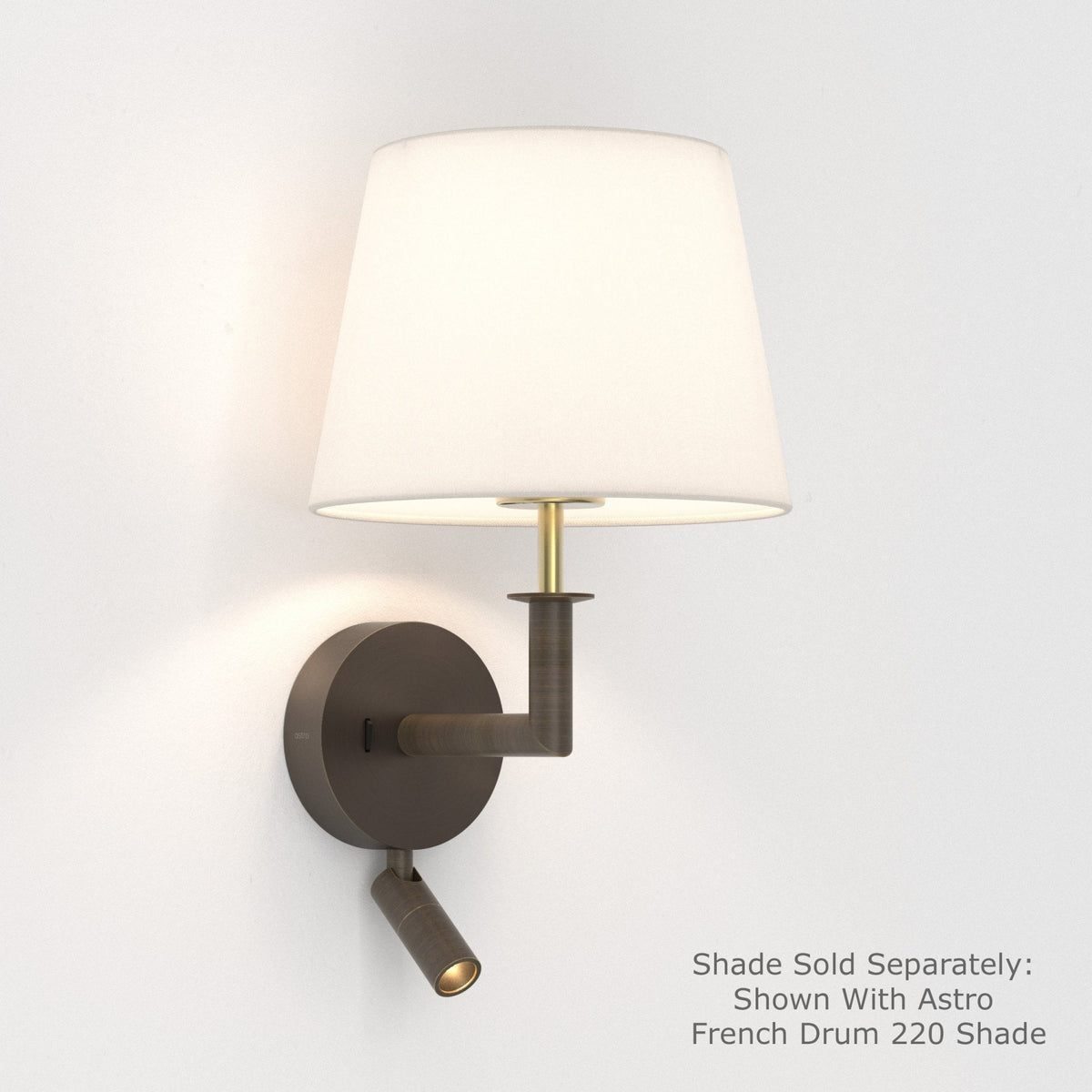 Bronze wall light with a white fabric shade and an adjustable reading light below