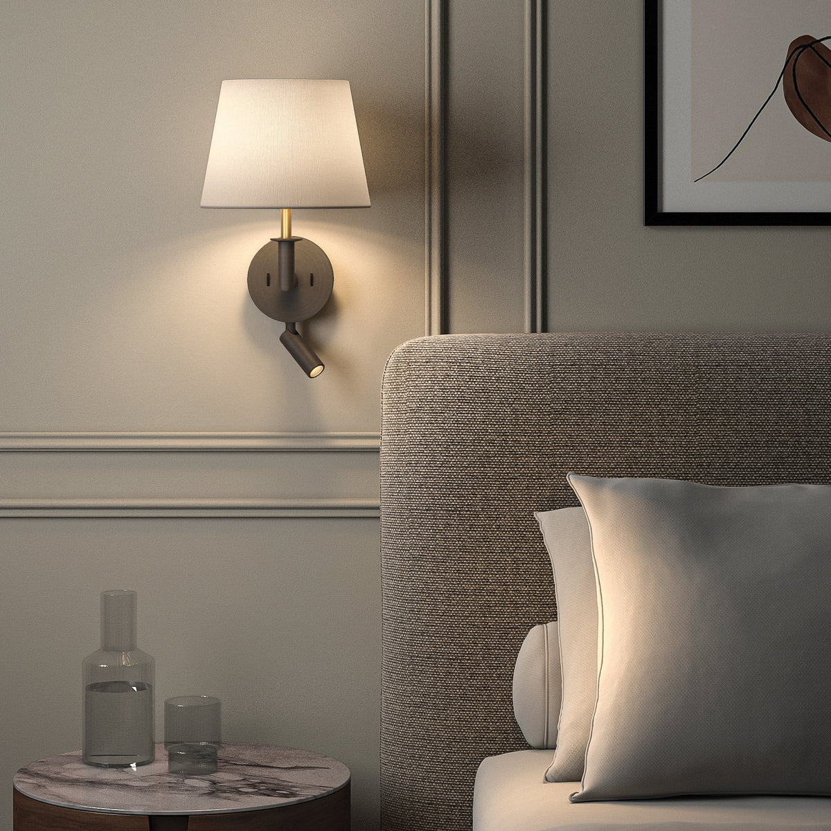 Wall-mounted lamp with a white shade and a directional spotlight, illuminating a bedroom scene