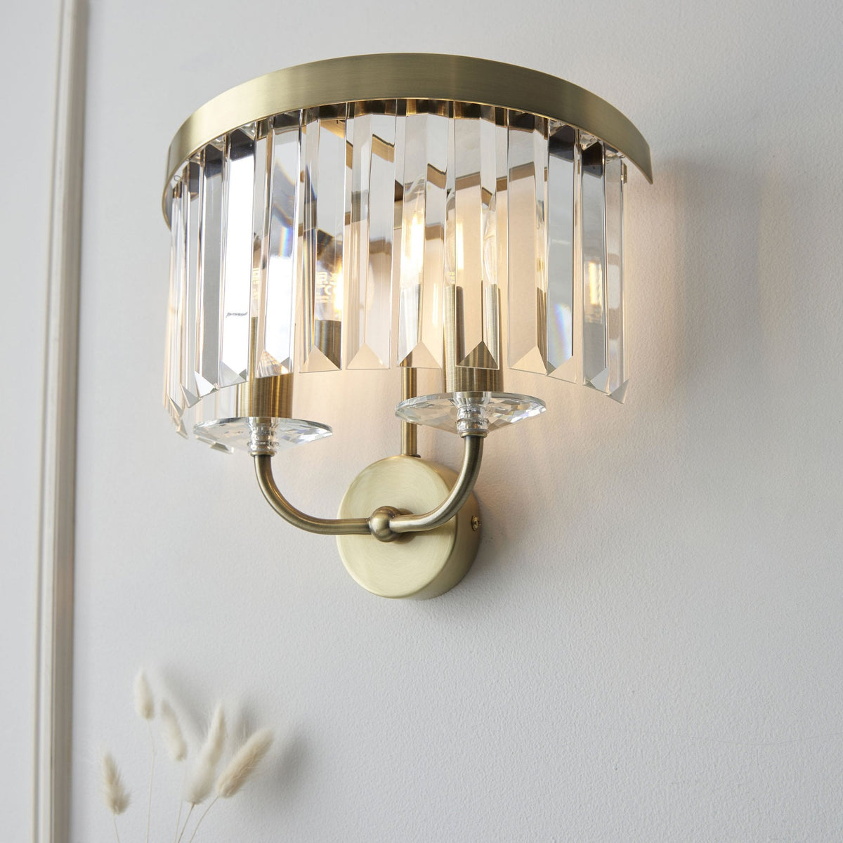 Yetminster Twin Lamp Wall Light in Antique Brass & Clear Cut Faceted Glass