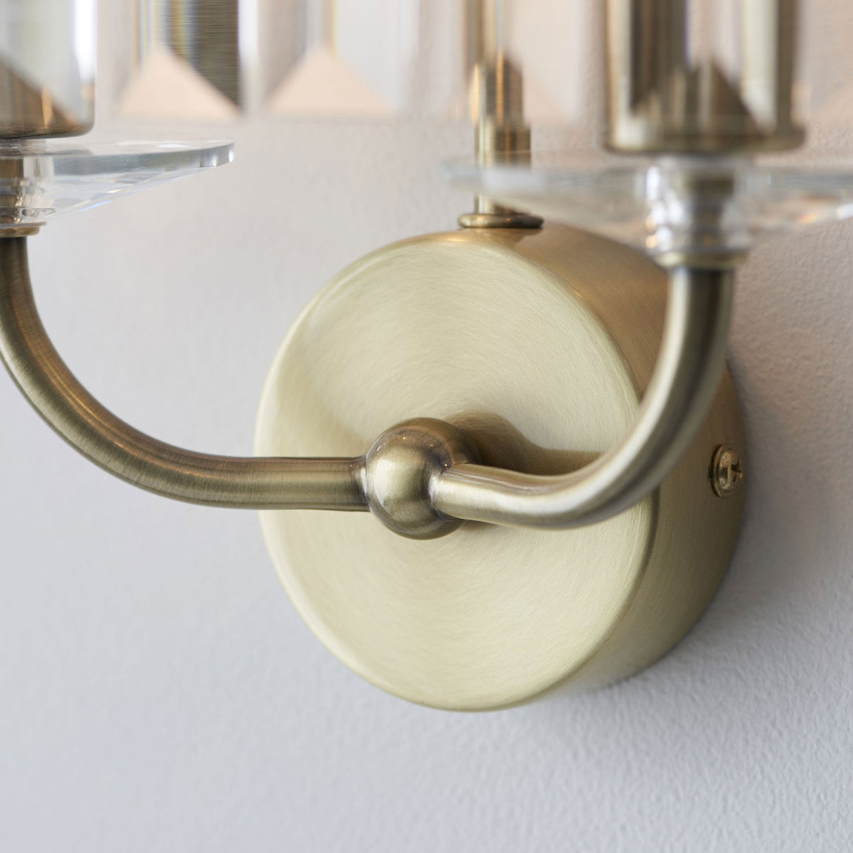 Yetminster Twin Lamp Wall Light in Antique Brass & Clear Cut Faceted Glass