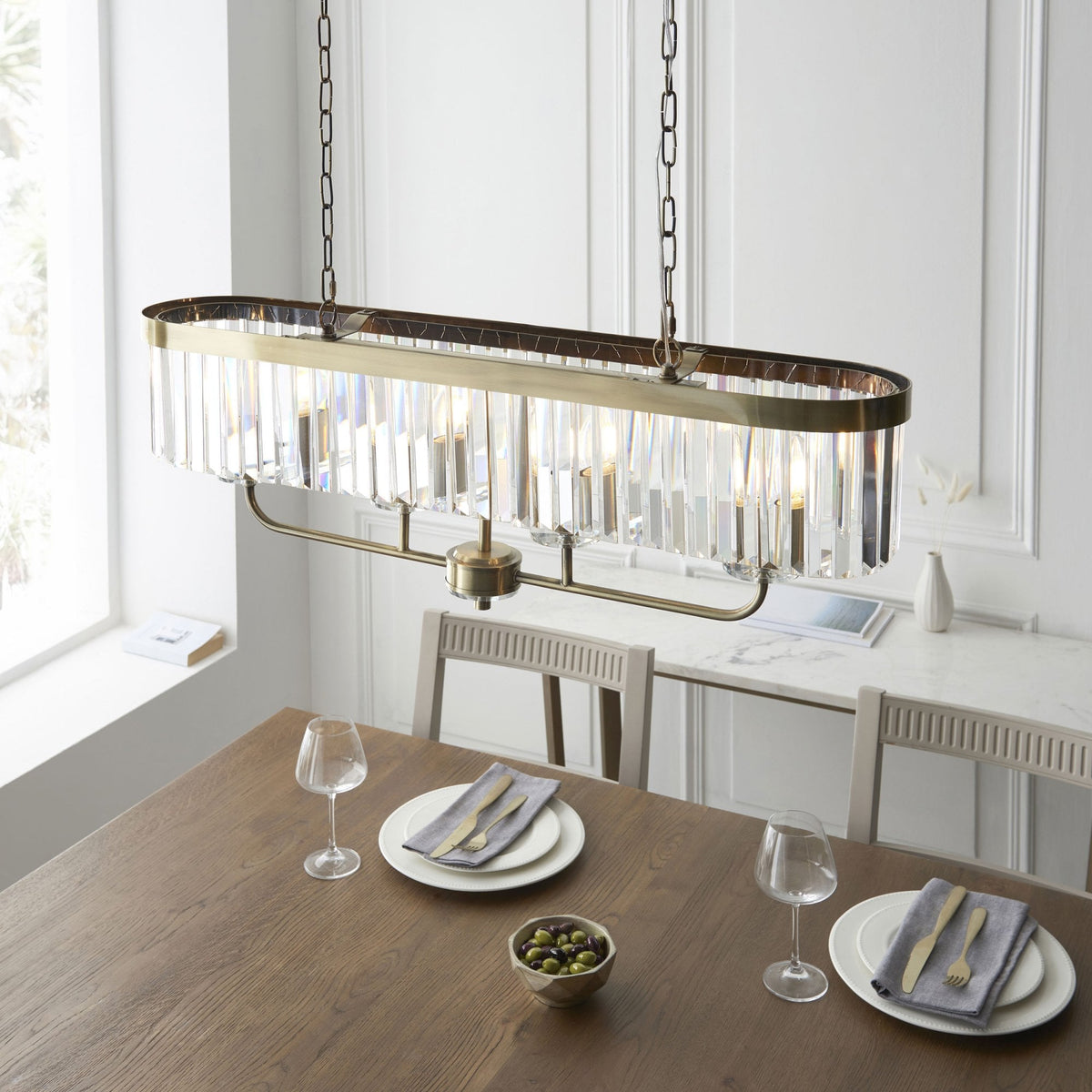 Yetminster 4 Light Linear Pendant in Antique Brass & Clear Cut Glass