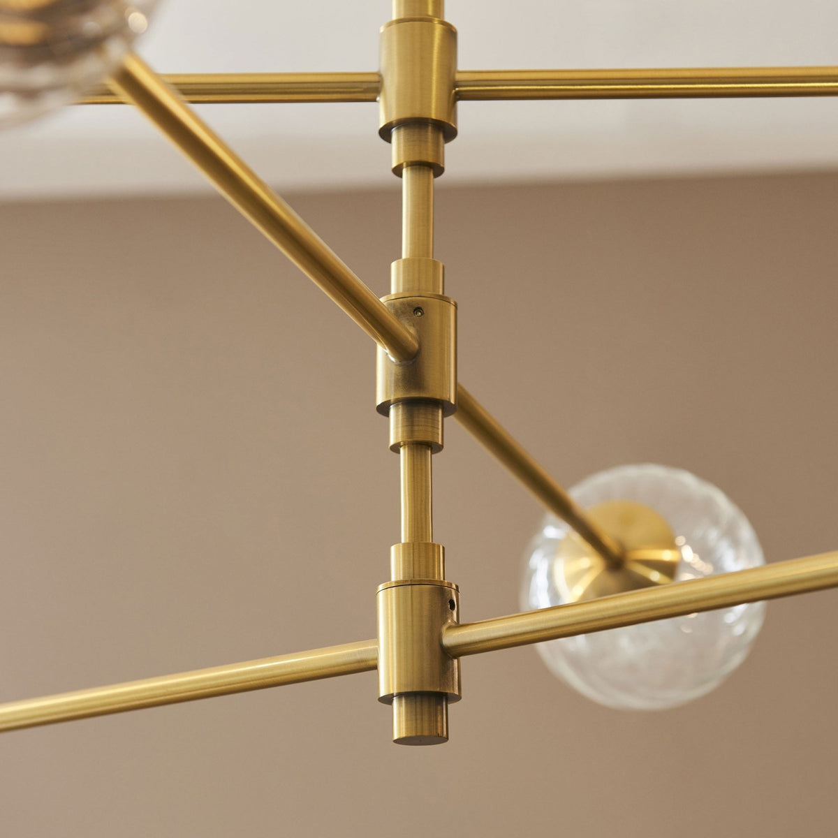 Selston Six Light Tiered Pendant in Brushed Aged Brass with Clear Twisted Pattern Glass