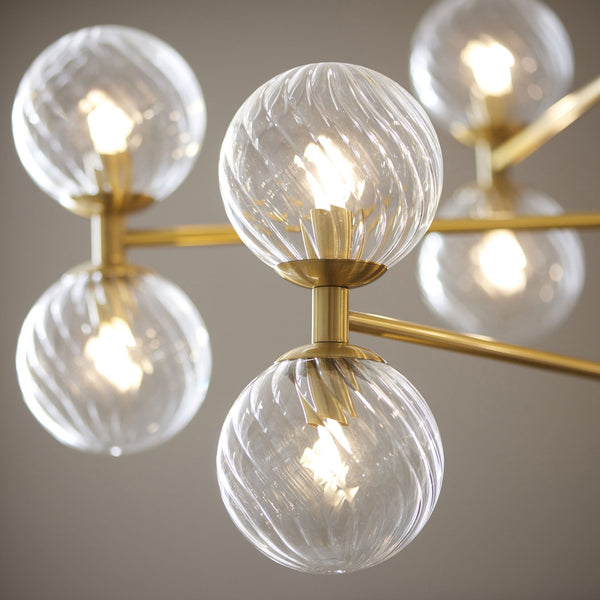 Selston Twelve Light Tiered Pendant in Brushed Aged Brass with Clear Twisted Pattern Glass