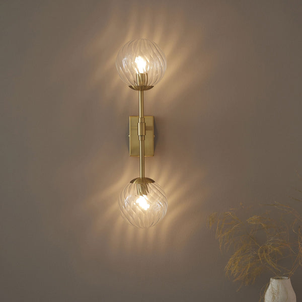 Selston Two Arm Wall Light in Brushed Aged Brass with Clear Twisted Pattern Glass