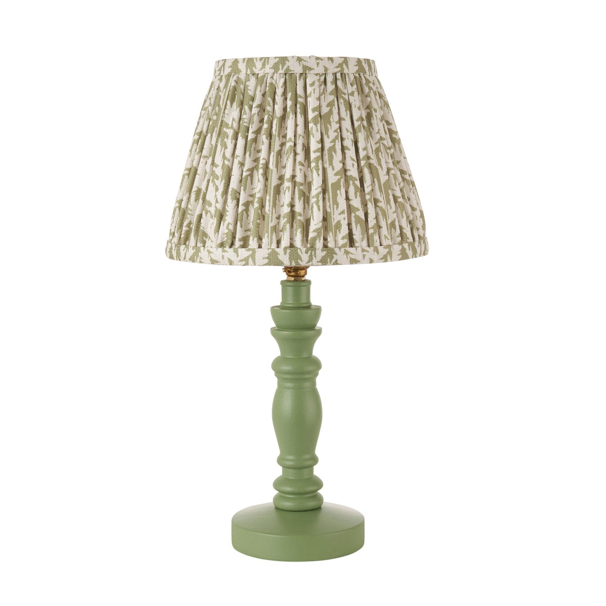 A table lamp with a green wooden base and a patterned fabric shade on a white background.
