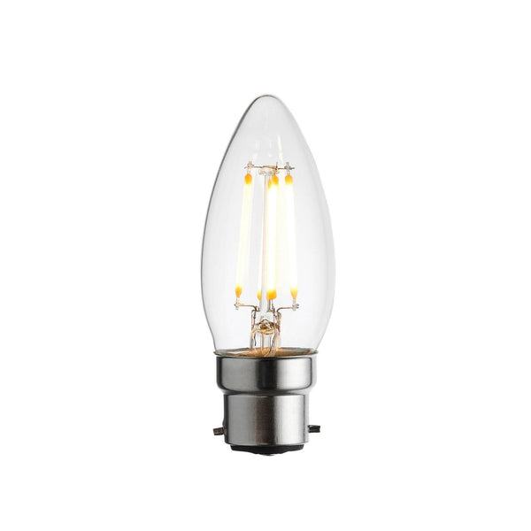 A clear LED filament candle bulb with a silver bayonet fitting on a white background.