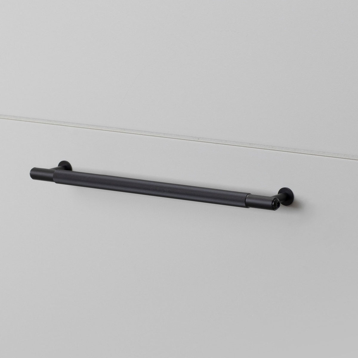 Linear Knurled Medium Pull Bar Cabinet Handle In Black