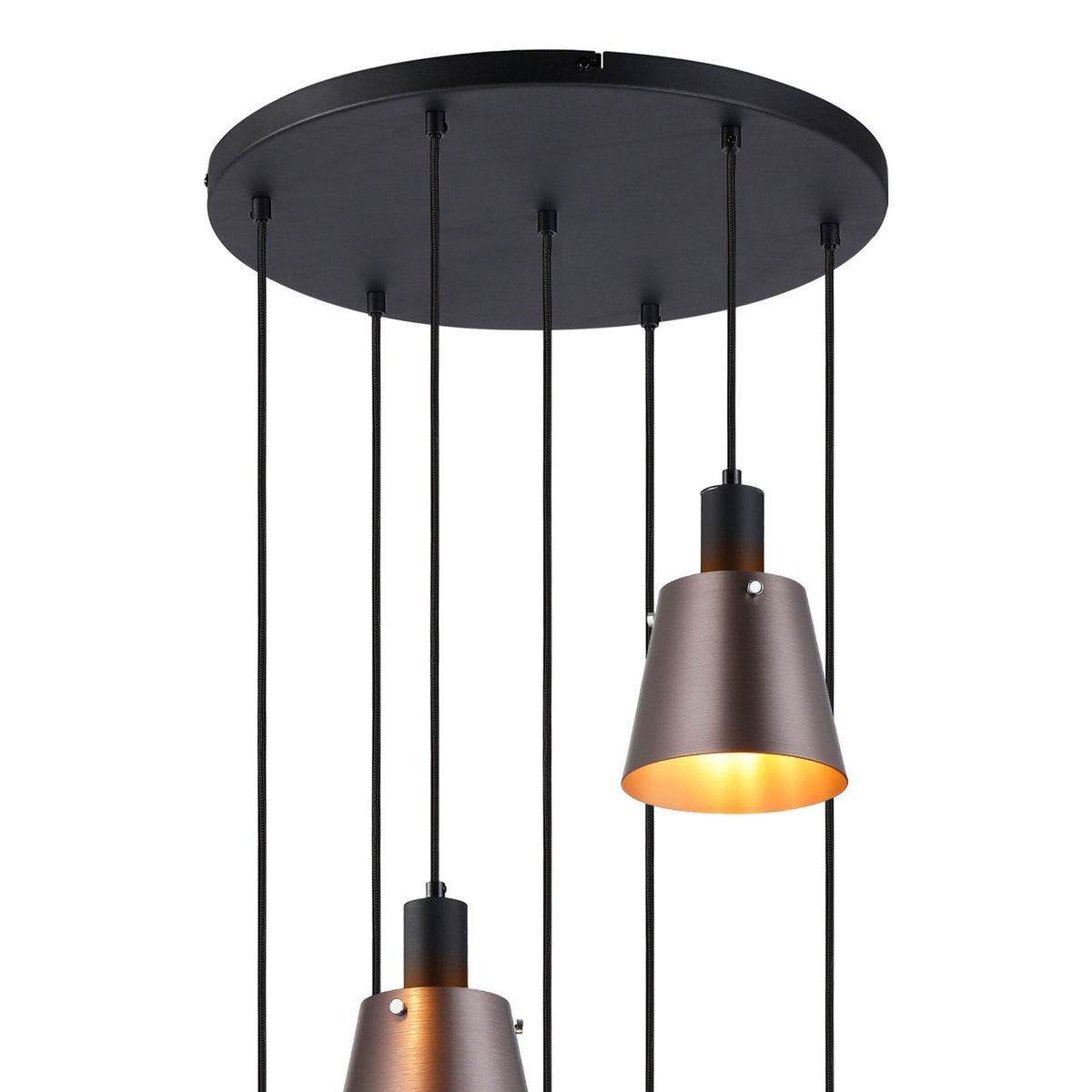 Close-up of two antique copper and black pendant lights with a black ceiling rose.