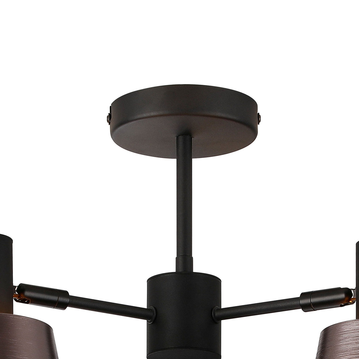 A close-up view of the ceiling rose and central stem of the three-arm ceiling light.