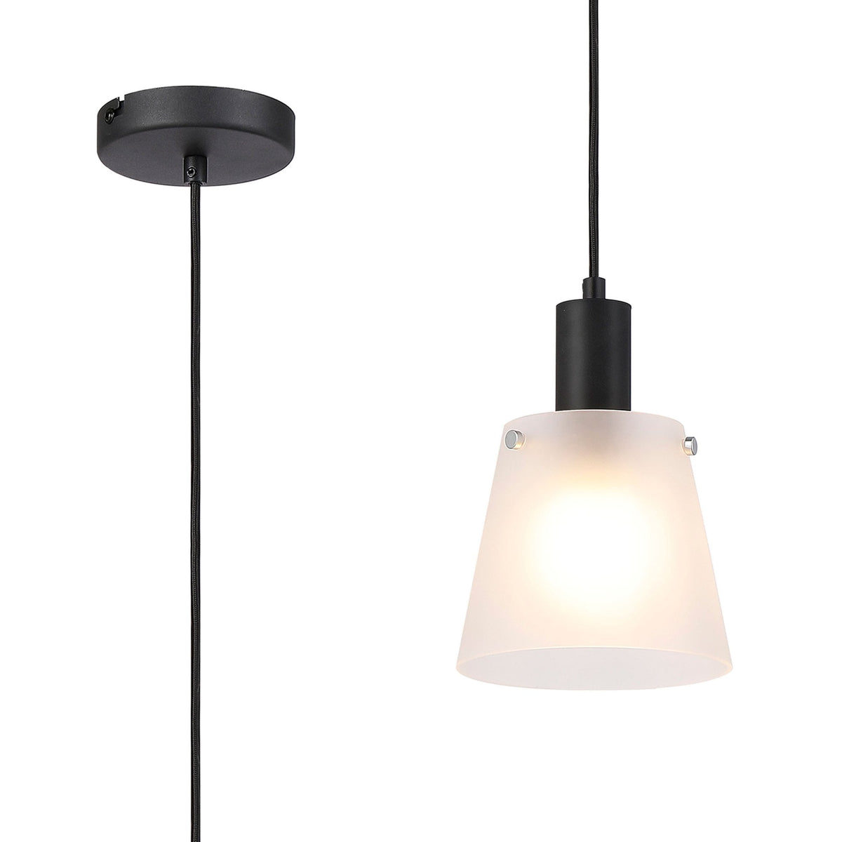 A minimalist black ceiling rose and cable, with a frosted glass pendant light.