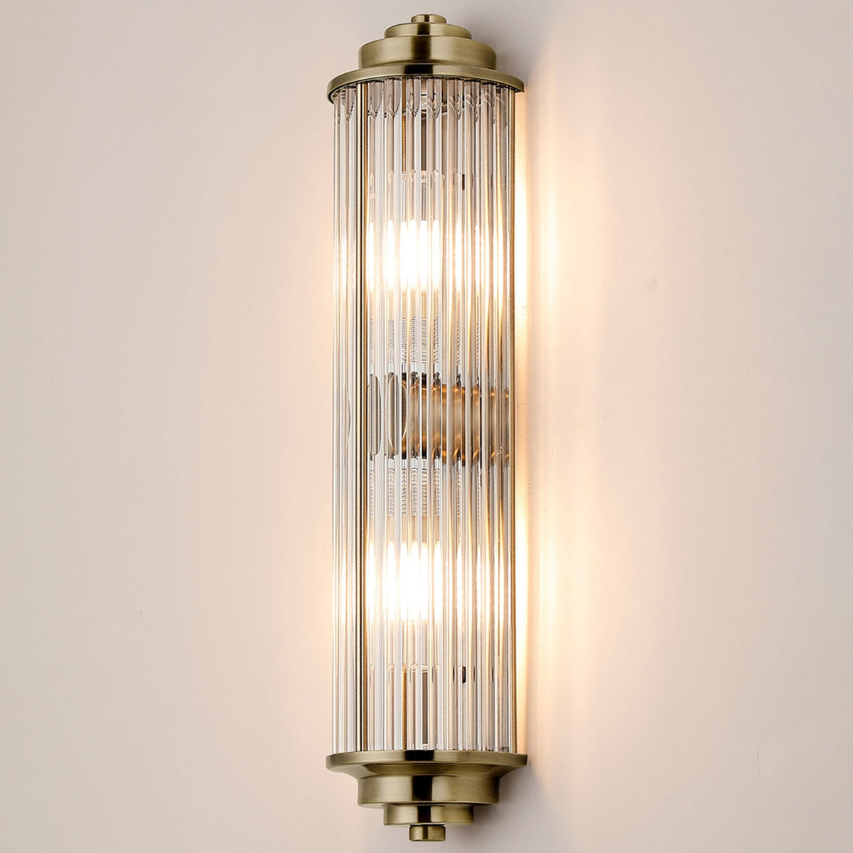 Tansley G9 Twin Lamp IP44 Flush Wall Light in Antique Brass with Clear Glass Rods