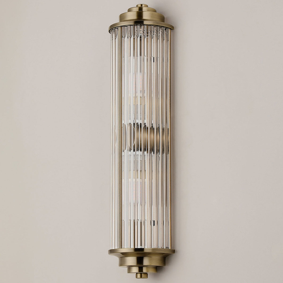 Tansley G9 Twin Lamp IP44 Flush Wall Light in Antique Brass with Clear Glass Rods