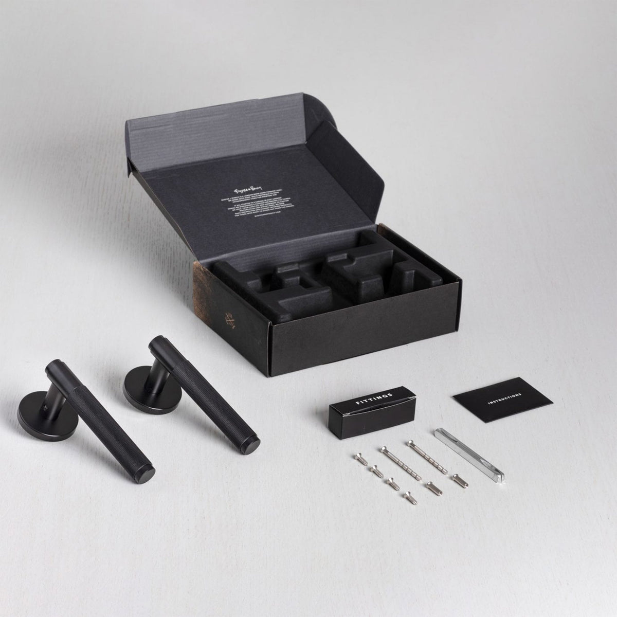 Cross Cut Knurled Door Handle Set In Black