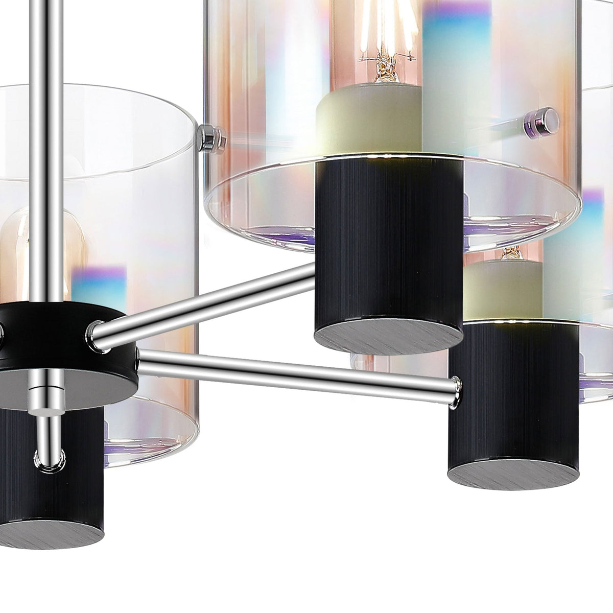 Close-up of the arms and shades of a modern five-light chandelier.