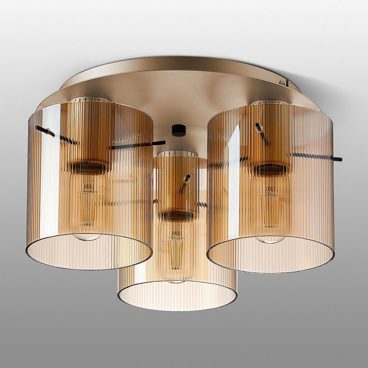 Belstone Fine Ribbed Triple Flush Round Ceiling Light in Light Gold with Amber Glass