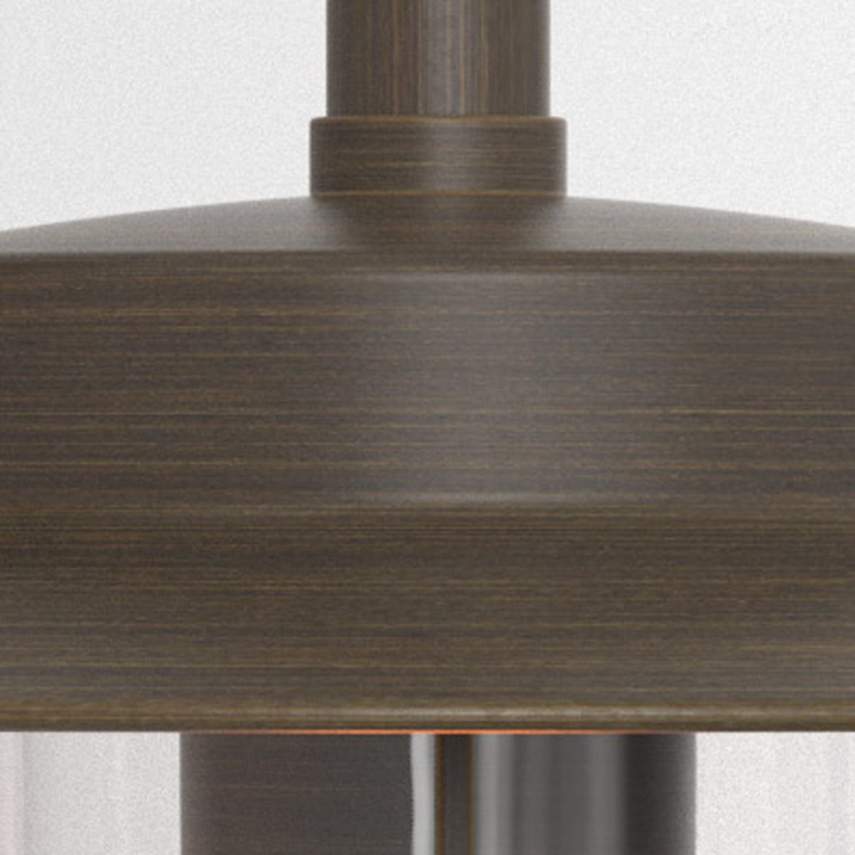 Close-up of a bronze outdoor heater with a visible flame at the bottom.