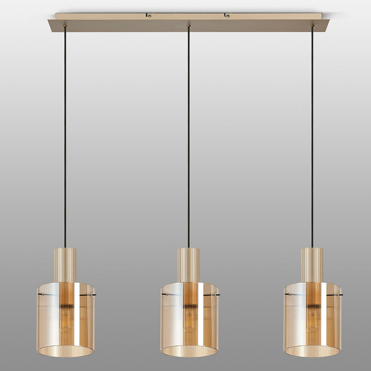 Contemporary three-light pendant fixture featuring amber glass and gold-tone details.