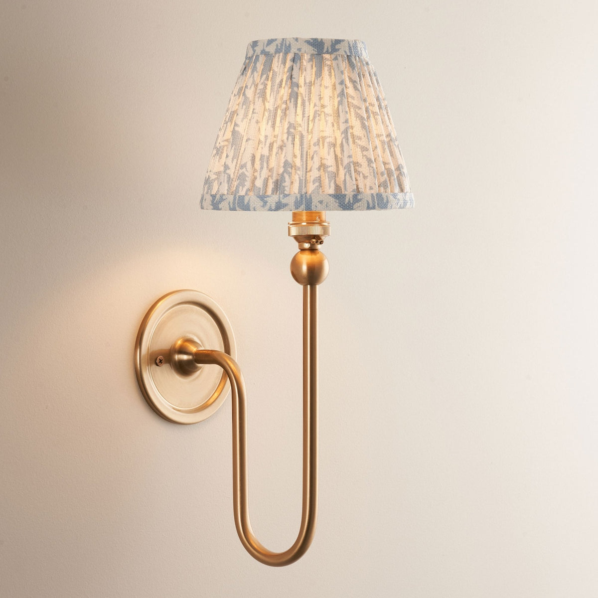 Santiago Curved Wall Light in Brushed Aged Brass with Leaf 16cm Shell Bay Blue Shade