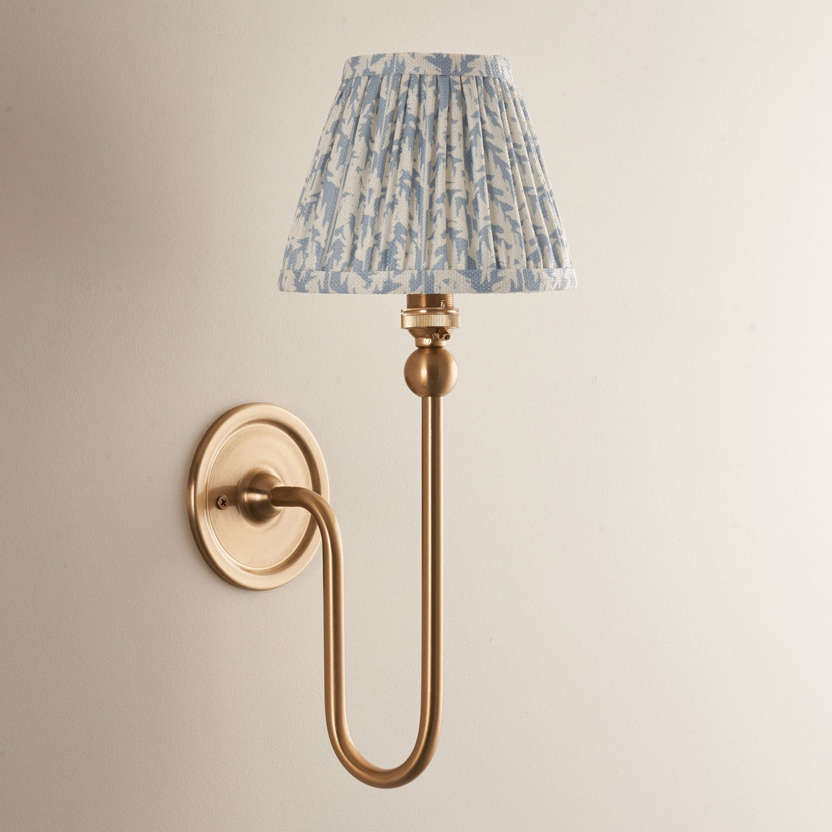 Santiago Curved Wall Light in Brushed Aged Brass with Leaf 16cm Shell Bay Blue Shade