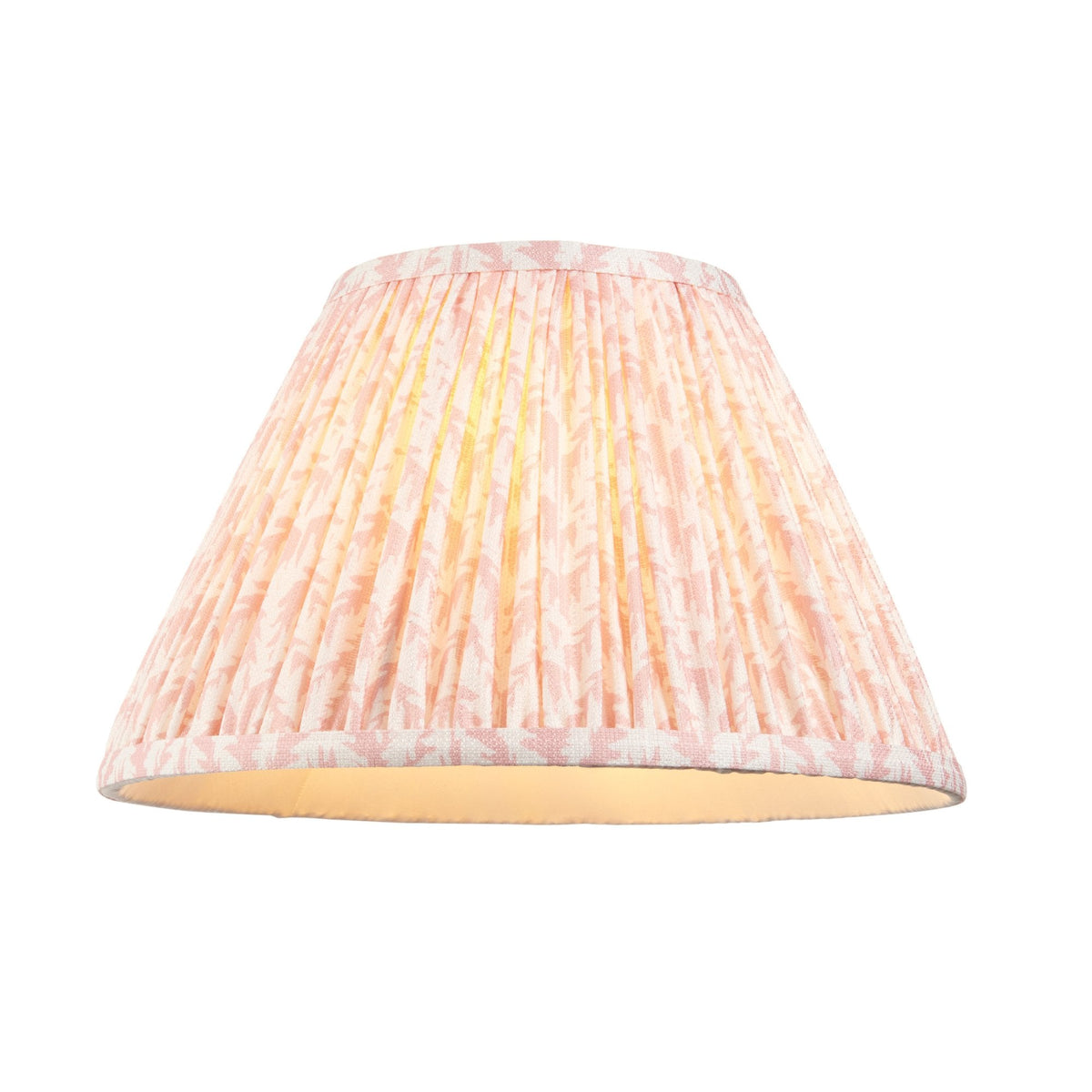 A pleated, patterned lampshade with an inner glow on a white background.