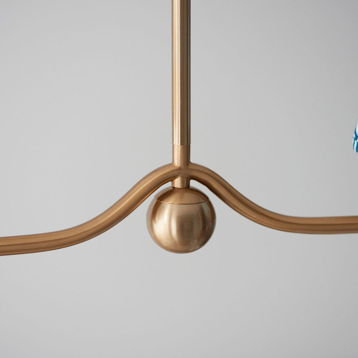 Santiago Four Lamp Linear Pendant in Brushed Aged Brass with Ripple 16cm Marlin Blue Shade