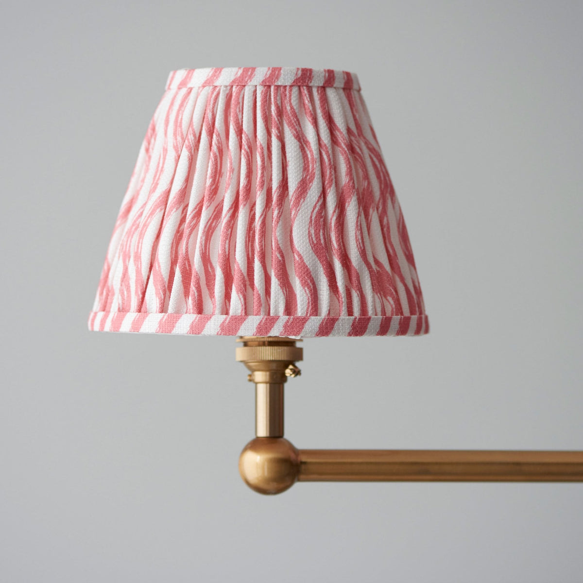 Santiago Four Lamp Linear Pendant in Brushed Aged Brass with Ripple 16cm Coral Pink Shade
