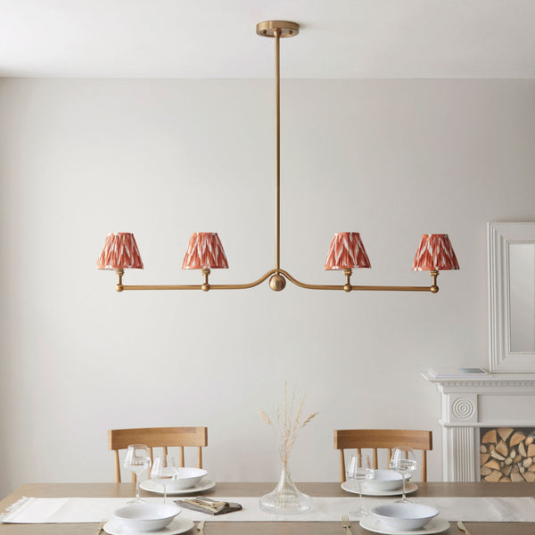 Santiago Four Lamp Linear Pendant in Brushed Aged Brass with Zigzag 16cm Apricot Orange Shade
