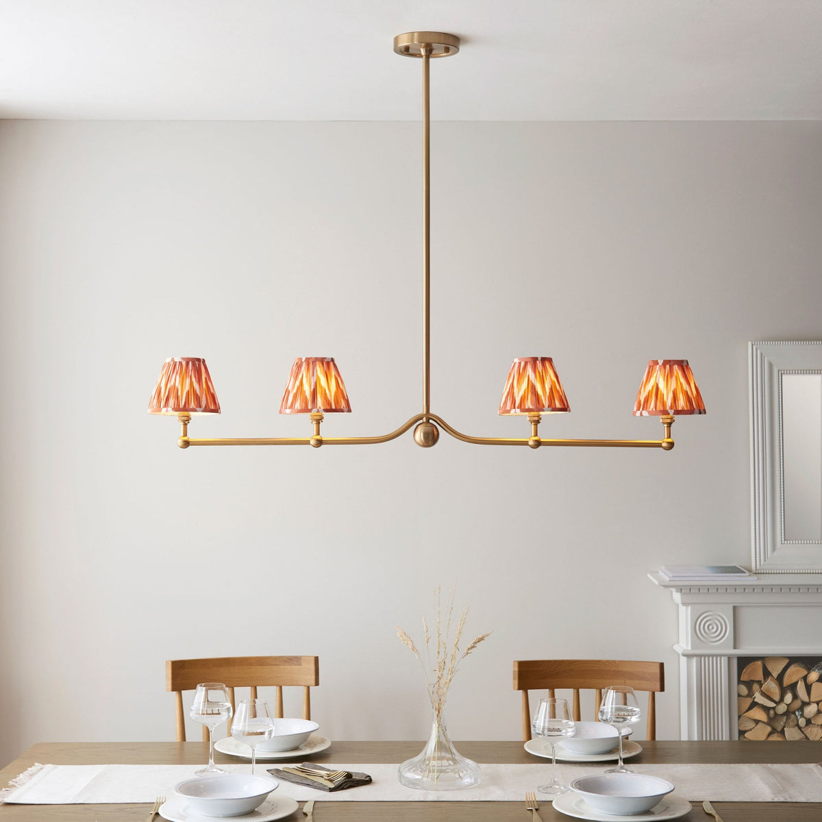 Santiago Four Lamp Linear Pendant in Brushed Aged Brass with Zigzag 16cm Apricot Orange Shade