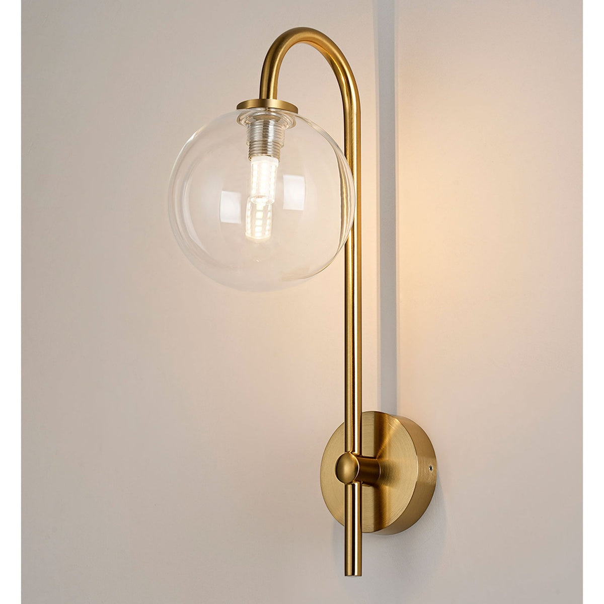 Tenterden Curved Arm IP44 Wall Light in Brass Gold with Smooth Round Clear Glass Diffuser