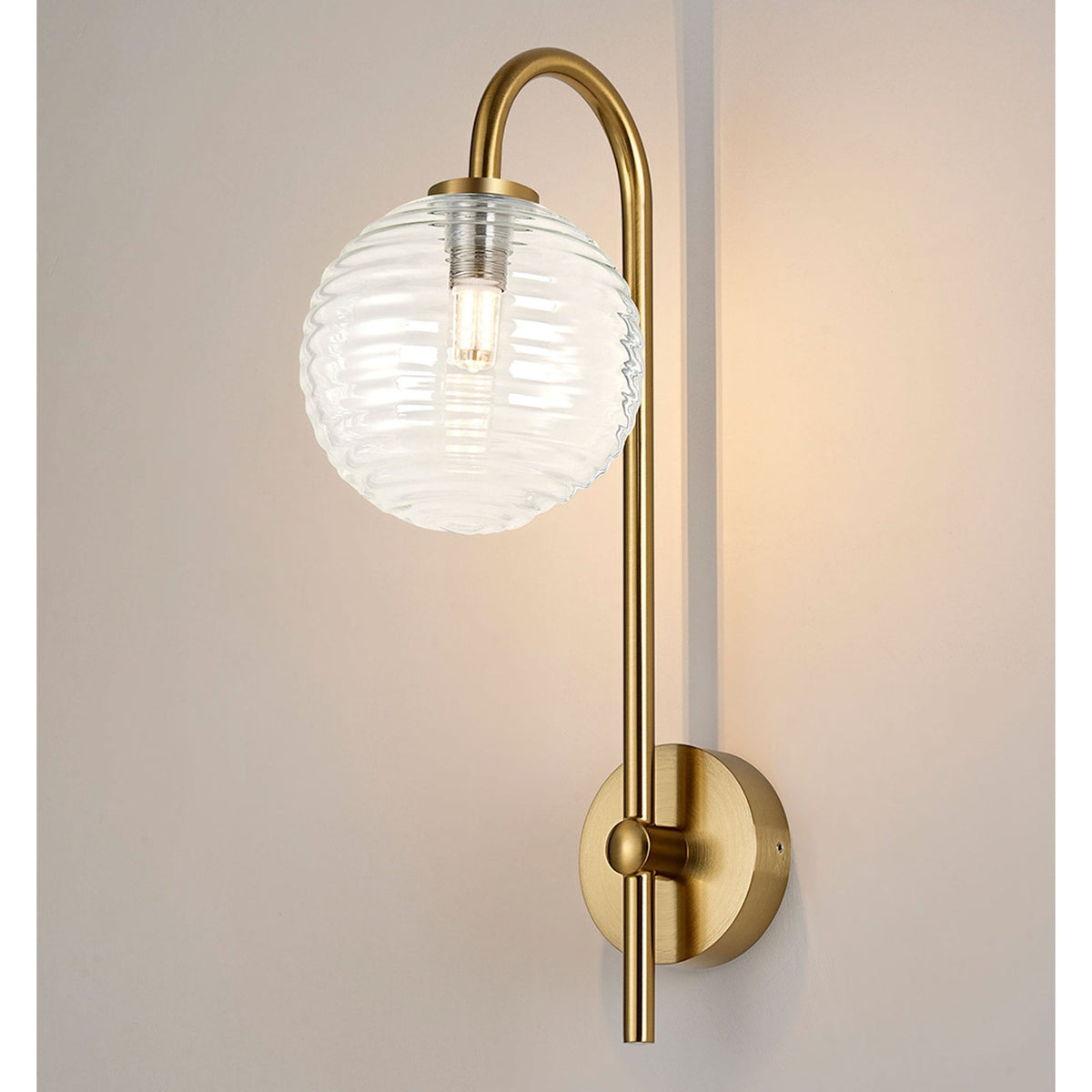 Tenterden Curved Arm IP44 Wall Light in Brass Gold with Ribbed Round Clear Glass Diffuser